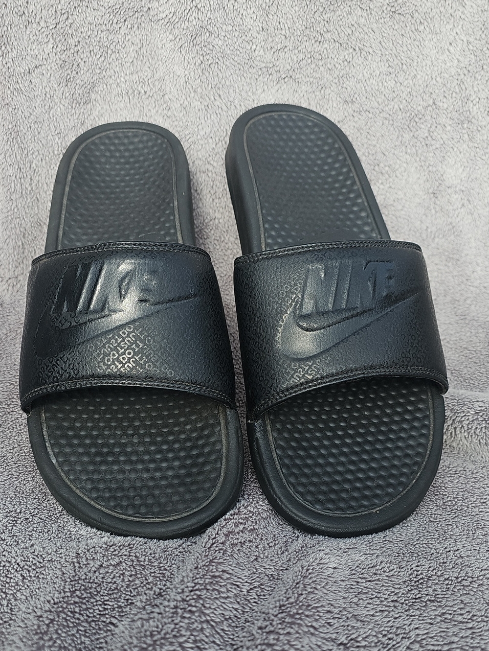 Nike Benassi JDI slides in Triple Black "Just Do It" graphic print